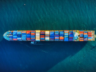 aerial view of shipping container boat on water